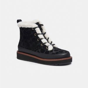 Brand New never worn Coach Amani boots size 5 with faux fur lining.